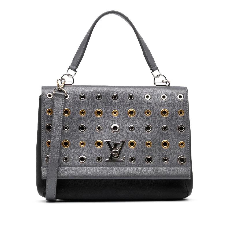 Yves Saint Laurent leather crossbody bagsGray Louis Vuitton Eyelet LockMe II Satchel