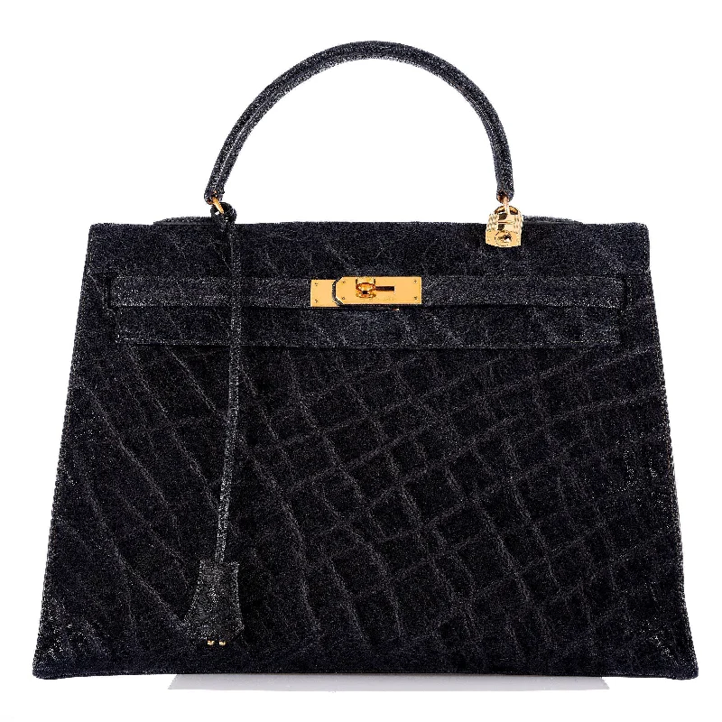 Hermès Kelly Bags in a rare shade of royal purple for a statementHermès Kelly 35 Sellier Black Elephant Hide Gold Hardware