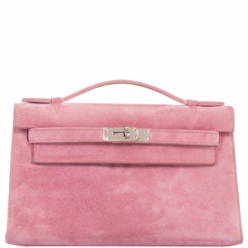 Hermès Kelly Bags with a hand - burnished edge finish for a vintage charmHermès Kelly Pochette Pink Veau Doblis Suede with Palladium Hardware