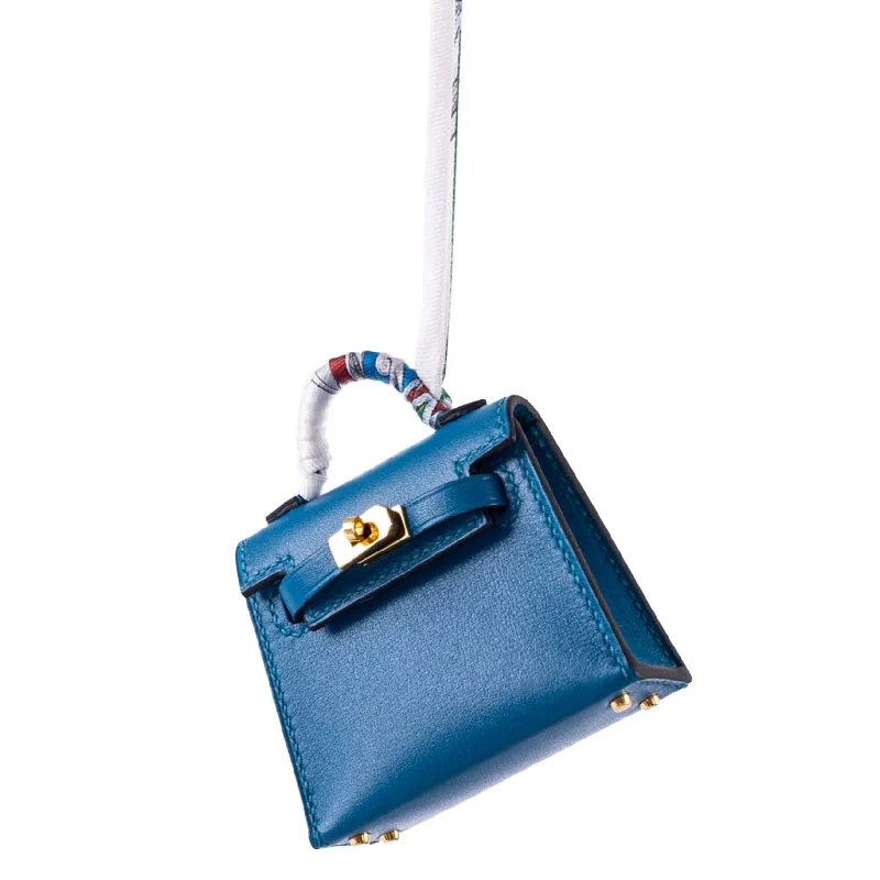 Hermès Kelly Bags with a chain - embellished handle for a modern twistHermès Micro Kelly Twilly Charm Blue Izmir Tadelakt Leather Gold Hardware - 2020, Y