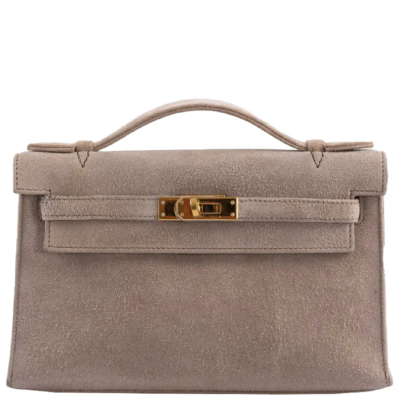 Hermès Kelly Bags with a contrast - colored interior liningHermès JPG Kelly Pochette Gris Pale Veau Doblis Suede Gold Hardware