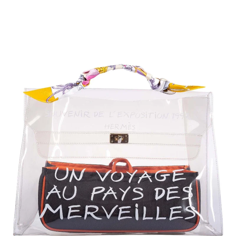 Hermès Kelly Bags in a soft ivory color for an elegant aestheticHermès  Kelly 40 Transparent Vinyl Souvenir de l'Exposition Bag