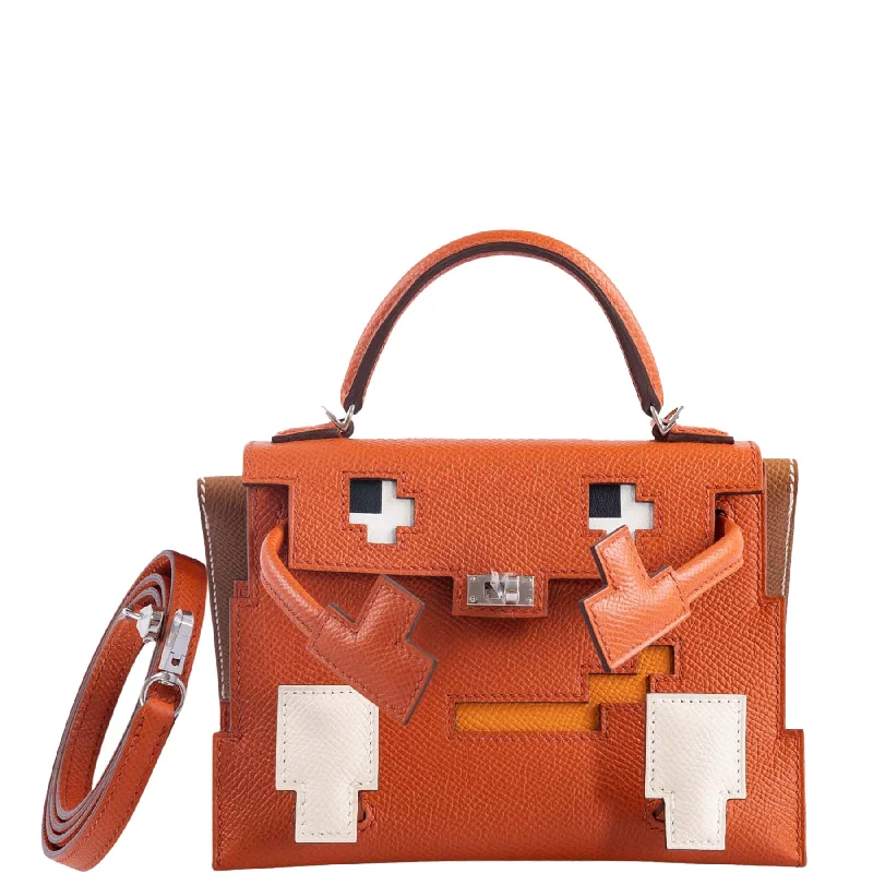 Hermès Kelly Bags with a detachable keychain holderHermès Kelly Doll Quelle Idole Picto Terre Battue, Nata, Abricot, Gold Palladium Hardware