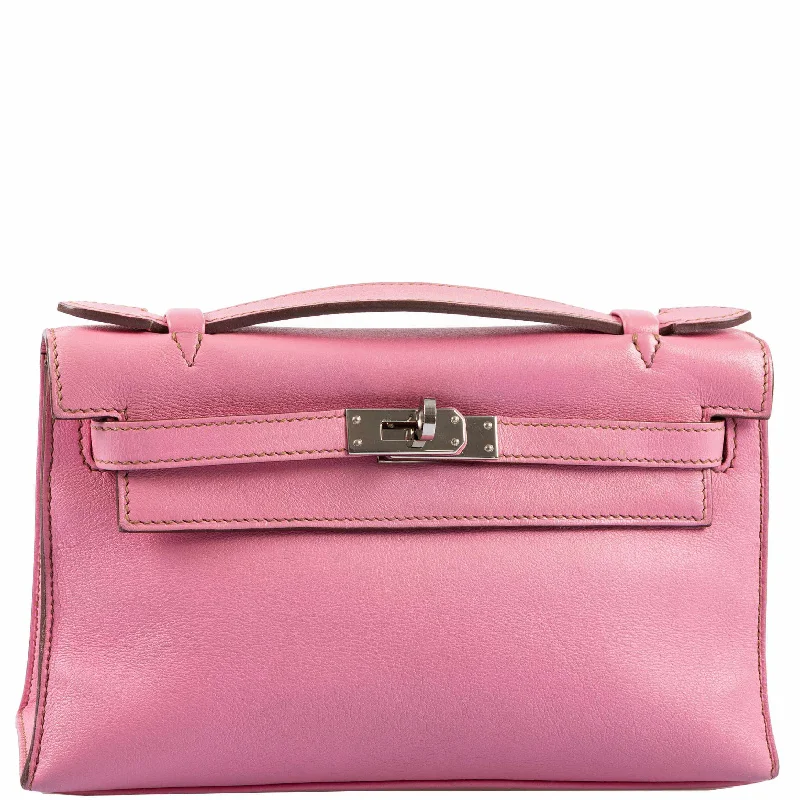 Hermès Kelly Bags in a rare shade of royal purple for a statementHermès Kelly Pochette 5P Swift with Palladium Hardware