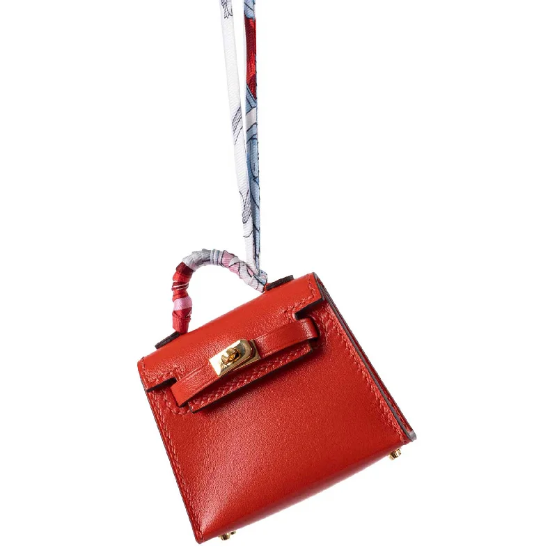 Hermès Kelly Bags with a detachable keychain holderHermès Micro Kelly Twilly Charm Feu Orange Tadelakt Leather Gold Hardware - 2020, Y