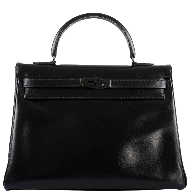 Hermès Kelly Bags featuring hand - painted floral motifsHermès So Black Kelly 35 Retourne Black Box Leather PVD Hardware - 2011, O Square