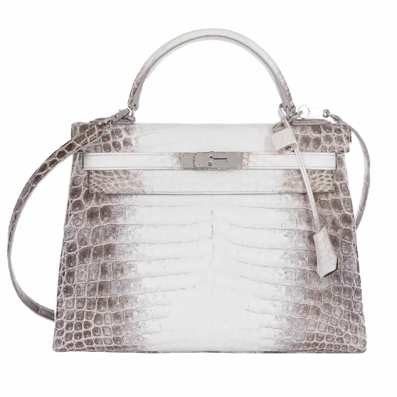 Hermès Kelly Bags in a rare shade of royal purple for a statementHermès Kelly 32 Himalayan Niloticus Crocodile Palladium Hardware